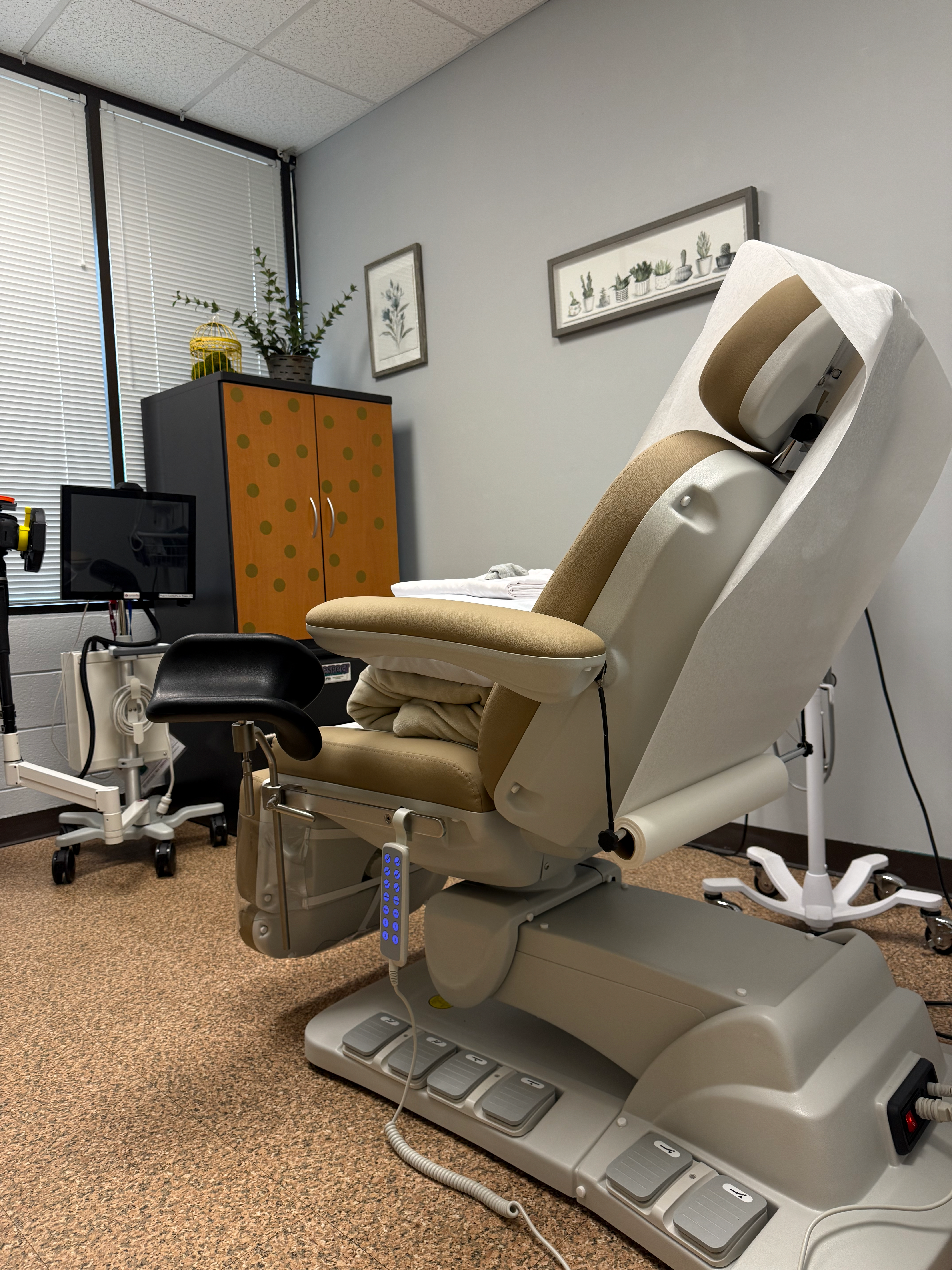 Solace_Chair Solace Center Examination Chair, back view into room.